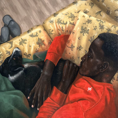 Traces of Him boy with a dog on a sofa
